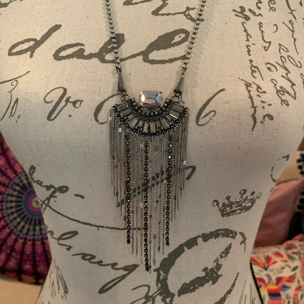 Antiqued Metal & Gem Medallion with Chain Tassels